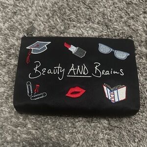 Black satin Lulu Guinness Embroidered Pouch with Red and White Accents